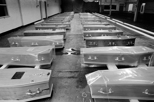 0_Coffins-in-a-disused-Liverpool-warehouse-waiting-for-gravediggers-to-end-their-strike-2